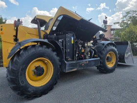Телескопичен товарач Caterpillar TH337C, снимка 7