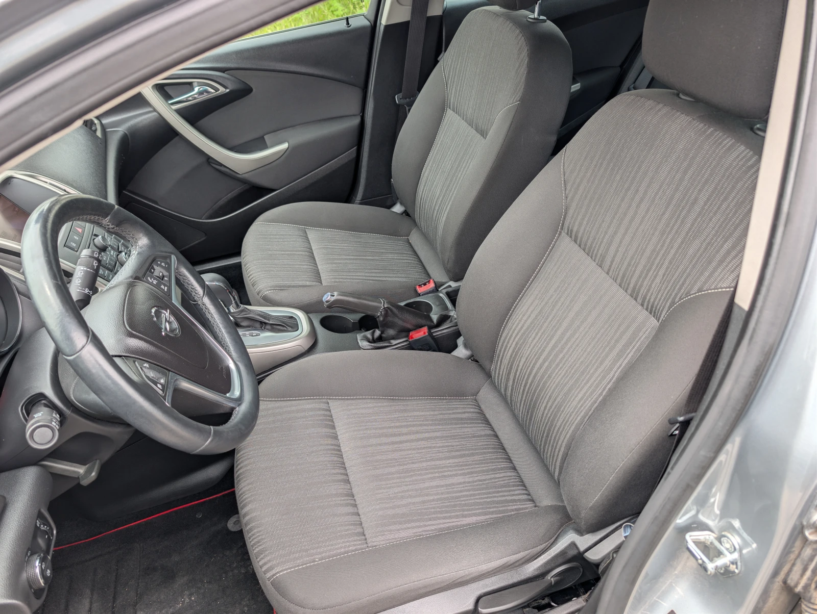 Opel Astra 1.6i/Navi/Xenon/Подгрев, снимка 11 - Автомобили и джипове - 54409424