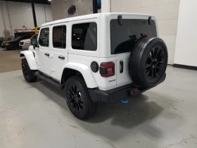 Jeep Wrangler 4xe* * SAHARA* * CAMERA* * ПОДГРЕВ* *  | Auto.bg — изображение 4