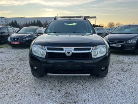 Dacia Duster 1.6i, снимка 1