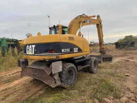Багер Cat М 315 С, снимка 4