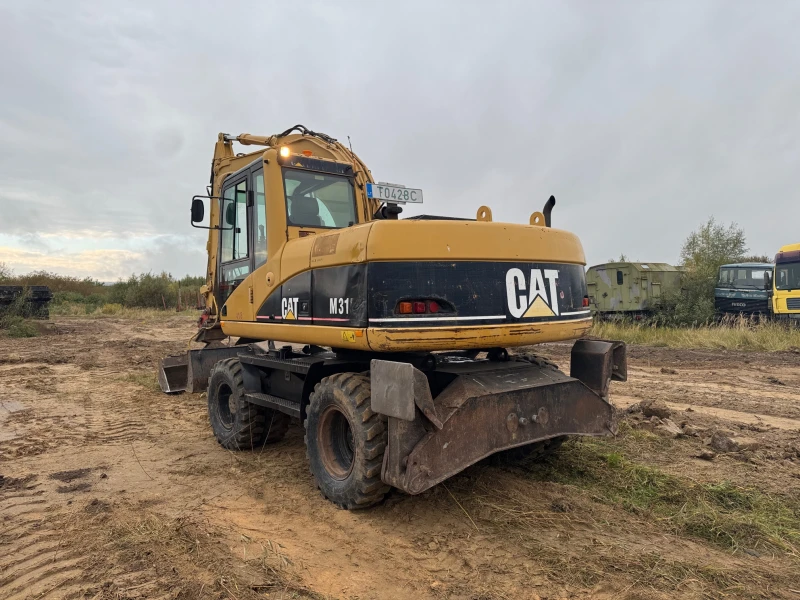 Багер Cat М 315 С, снимка 3 - Индустриална техника - 52106956