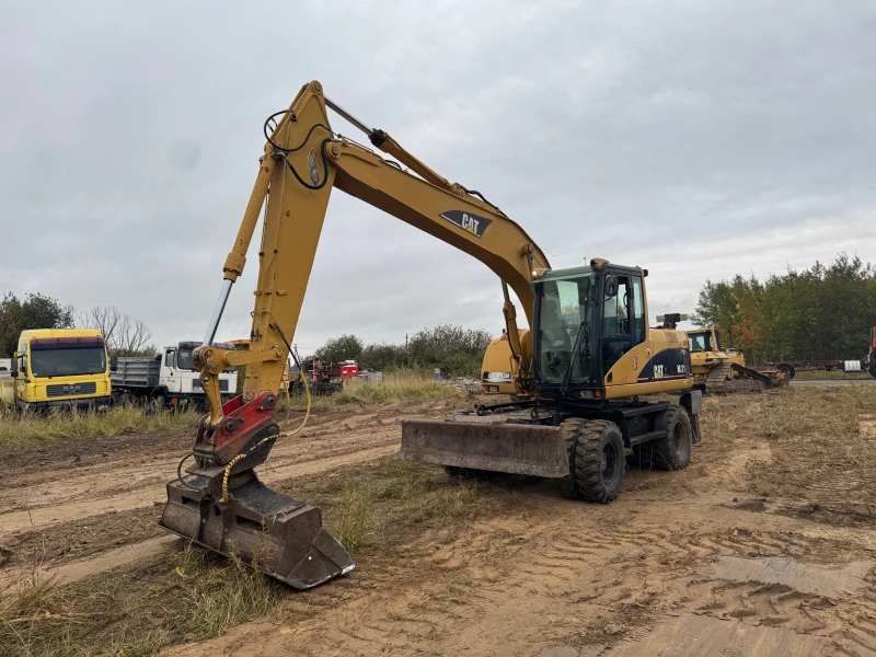 Багер Cat М 315 С