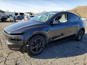 ������ Tesla Model Y
