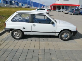 Opel Corsa 1.4, снимка 3 - Автомобили и джипове - 45615436
