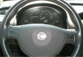 Opel Combo 1.3CDTI, снимка 7 - Автомобили и джипове - 44611606