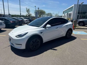 ������ Tesla Model Y