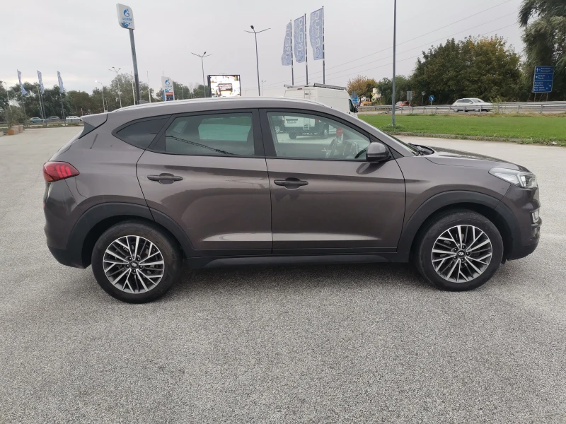 Hyundai Tucson 1.6 CRDI, снимка 6 - Автомобили и джипове - 52937372