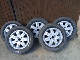 Гуми с джанти Други 195/65R15, снимка 1 - Гуми и джанти - 47930761