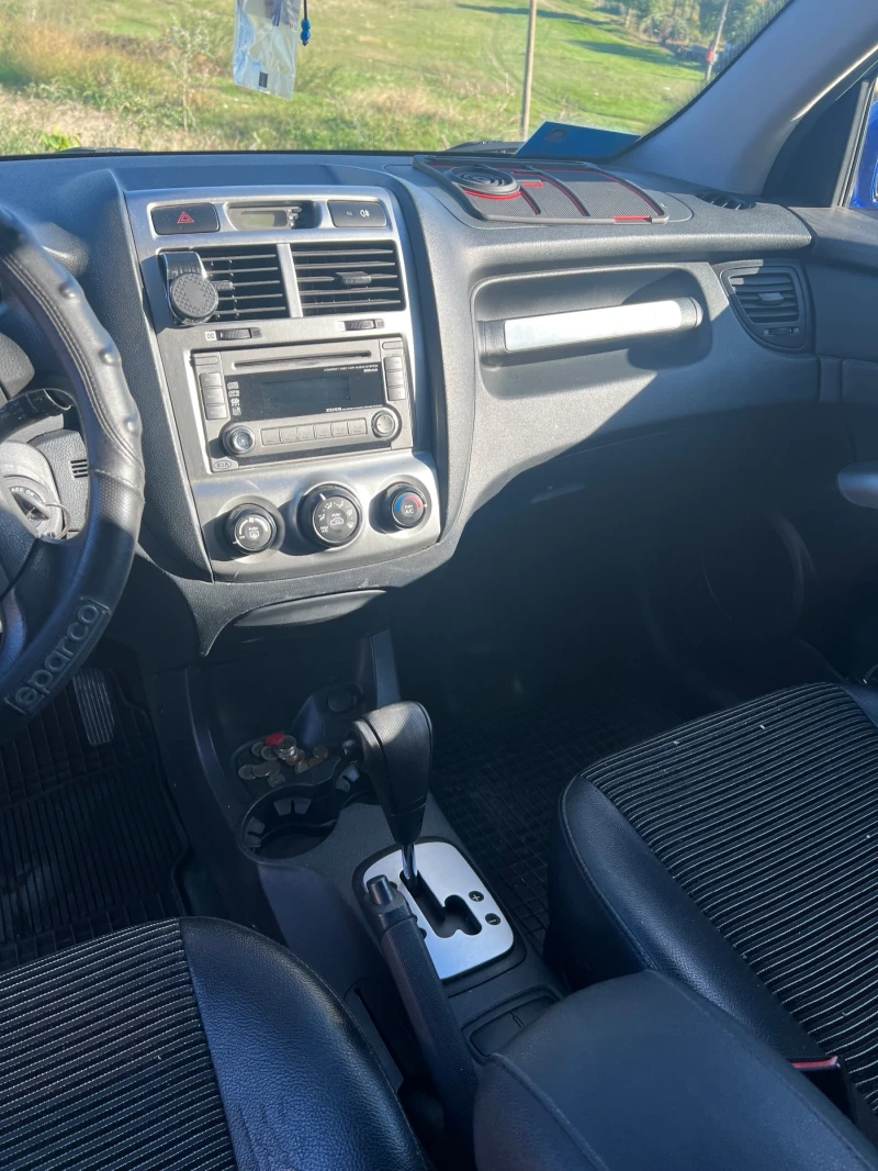 Kia Sportage, снимка 12 - Автомобили и джипове - 47643065