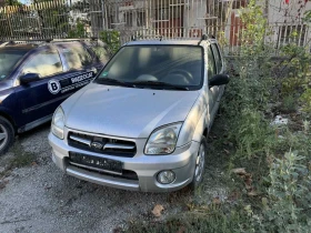     Subaru Justy 1.3i 