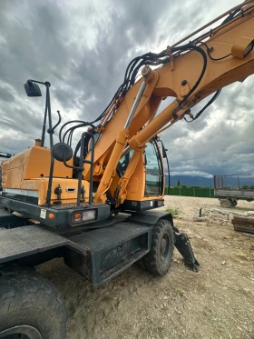 Багер Hyundai 140W-9A, снимка 10