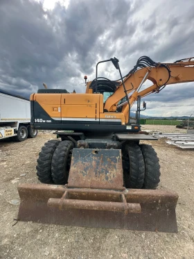 Багер Hyundai 140W-9A, снимка 11