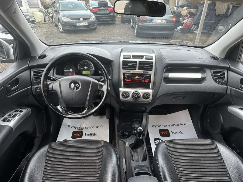 Kia Sportage 2.0/16v 4x4, снимка 12 - Автомобили и джипове - 53202522