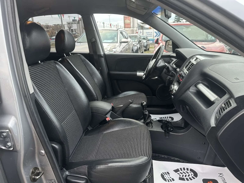 Kia Sportage 2.0/16v 4x4, снимка 14 - Автомобили и джипове - 53202522