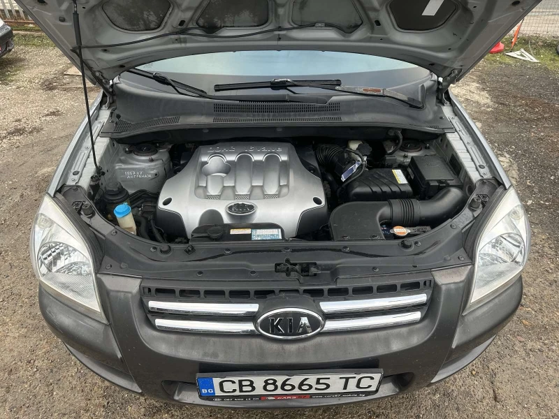 Kia Sportage 2.0/16v 4x4, снимка 17 - Автомобили и джипове - 53202522