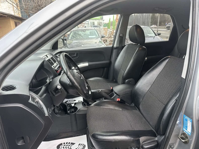 Kia Sportage 2.0/16v 4x4, снимка 9 - Автомобили и джипове - 53202522