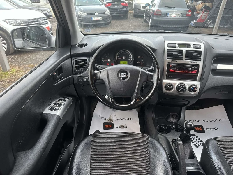 Kia Sportage 2.0/16v 4x4, снимка 11 - Автомобили и джипове - 53202522