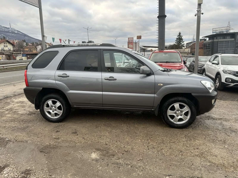 Kia Sportage 2.0/16v 4x4, снимка 7 - Автомобили и джипове - 53202522