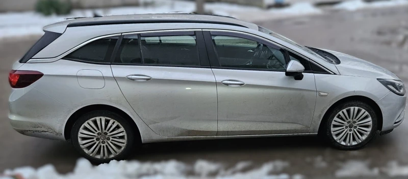 Opel Astra Sport Tourer, снимка 4 - Автомобили и джипове - 53112385