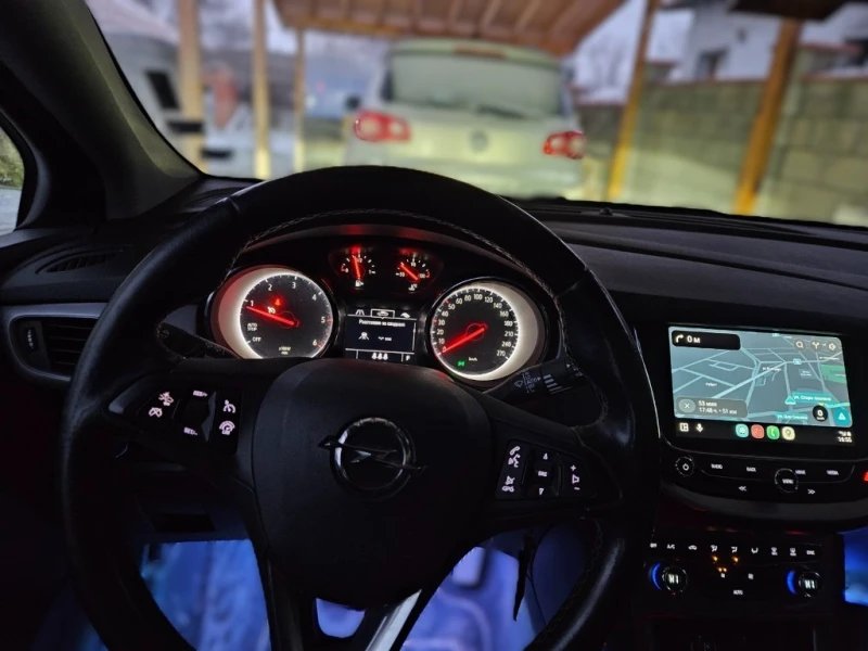 Opel Astra Sport Tourer, снимка 11 - Автомобили и джипове - 53112385