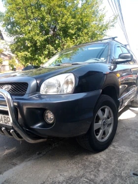 Hyundai Santa fe 2.7   V6      4* 4  + LPG, снимка 15