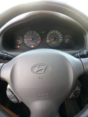 Hyundai Santa fe 2.7   V6      4* 4  + LPG, снимка 9