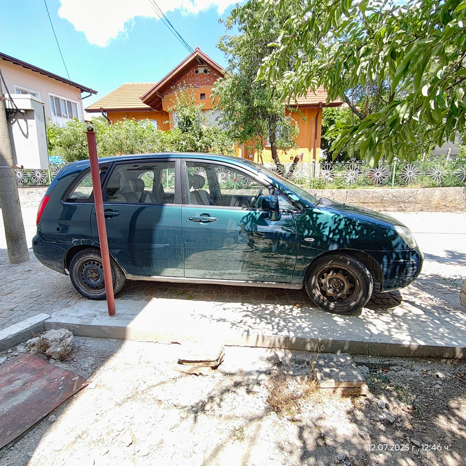 Suzuki Liana 1.6 ГАЗ - изображение 9