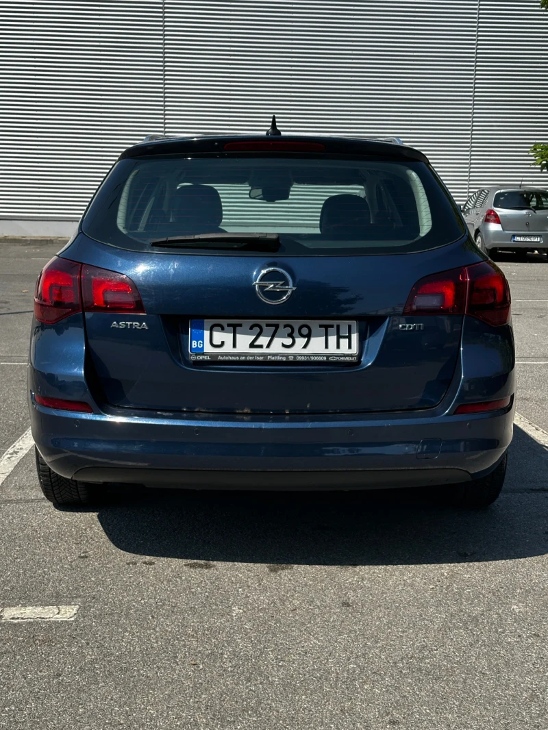 Opel Astra Sports Tourer, снимка 8 - Автомобили и джипове - 52950611