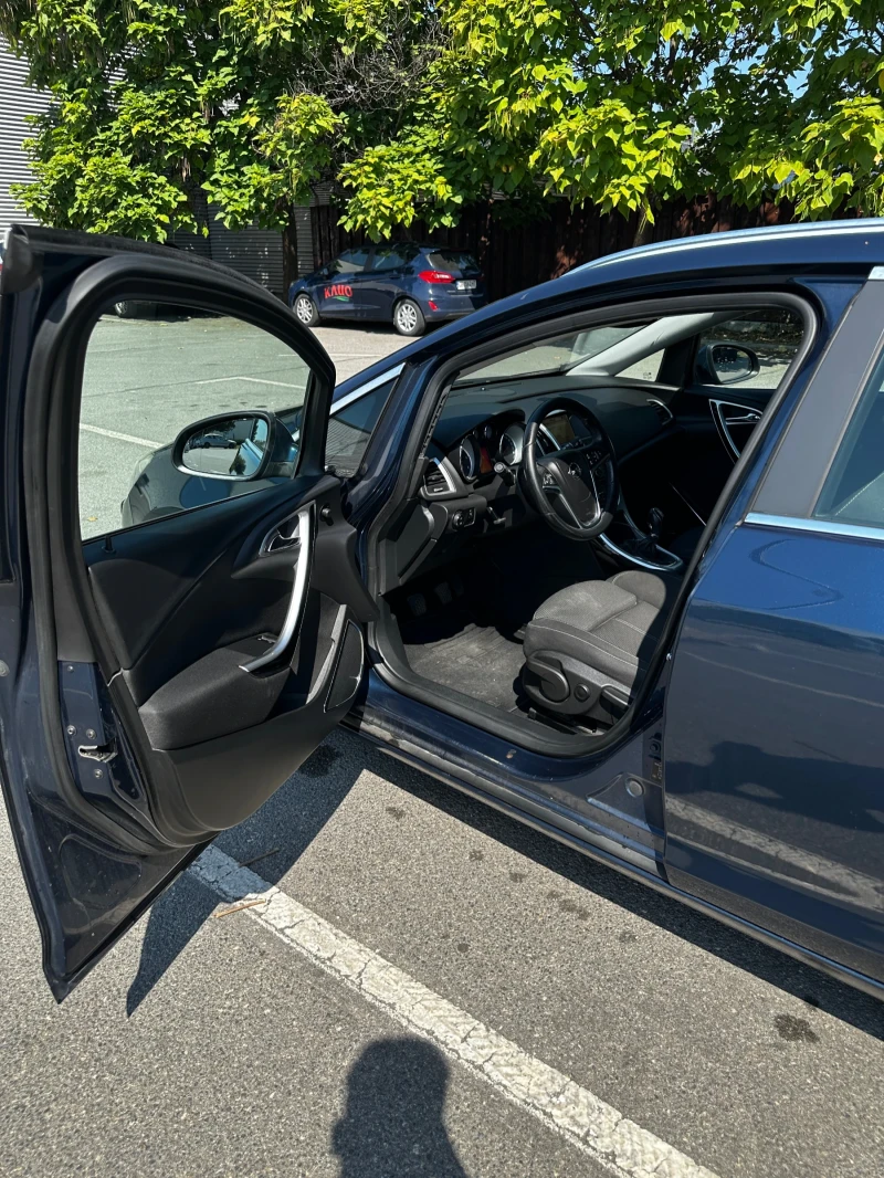Opel Astra Sports Tourer, снимка 17 - Автомобили и джипове - 52950611
