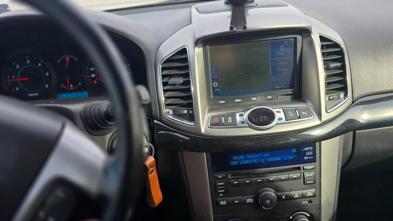 Chevrolet Captiva 2.2, снимка 11 - Автомобили и джипове - 53041744