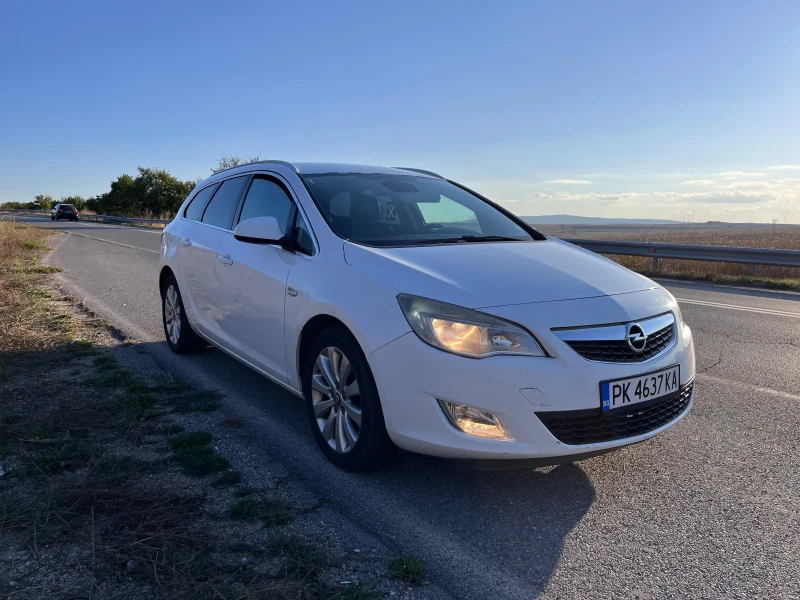 Opel Astra J, снимка 7 - Автомобили и джипове - 47334707