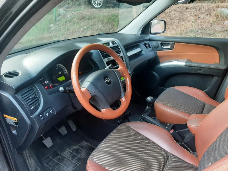 Kia Sportage 2.0i4x4 KLIMATRON KOJA, снимка 12 - Автомобили и джипове - 47768900