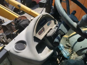  Komatsu WB93R | Mobile.bg    7