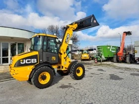 Телескопичен товарач JCB TM 220, снимка 7