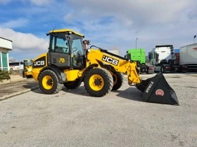 Телескопичен товарач JCB TM 220, снимка 6