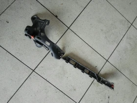 Водач задна броня ляв Опел Астра Н комби