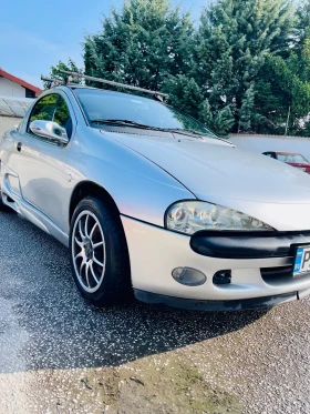 ������ Opel Tigra