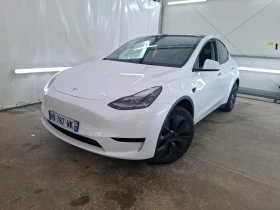 ������ Tesla Model Y