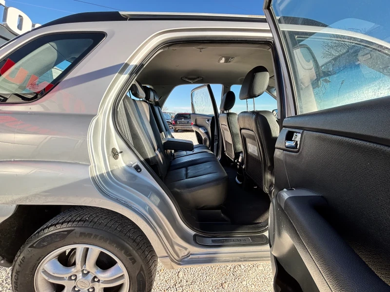 Kia Sportage 2.0CRDI/4Х4/ПОДГРЕВ, снимка 8 - Автомобили и джипове - 52613622