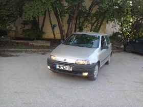 Fiat Punto 1.2 Газ-Бензин Климатик Обслужен 4 врати , снимка 17