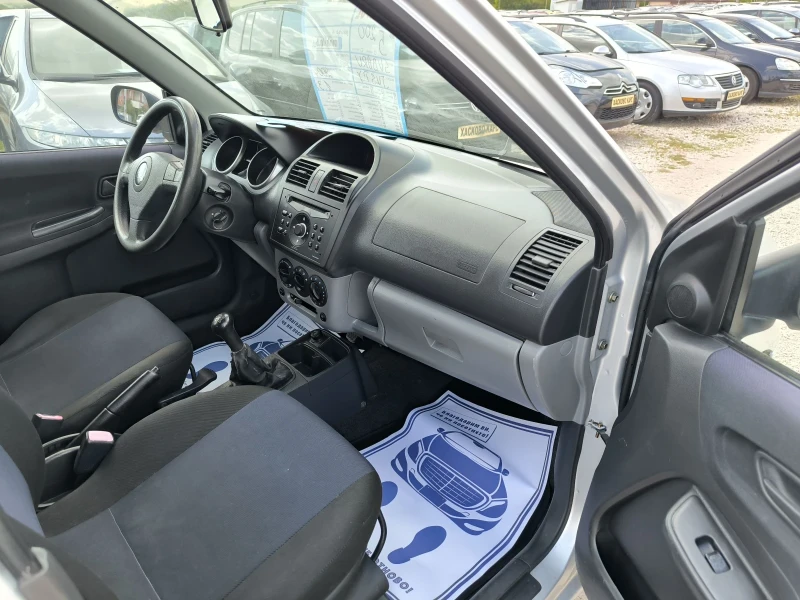 Subaru Justy 1.3i, снимка 6 - Автомобили и джипове - 51711977