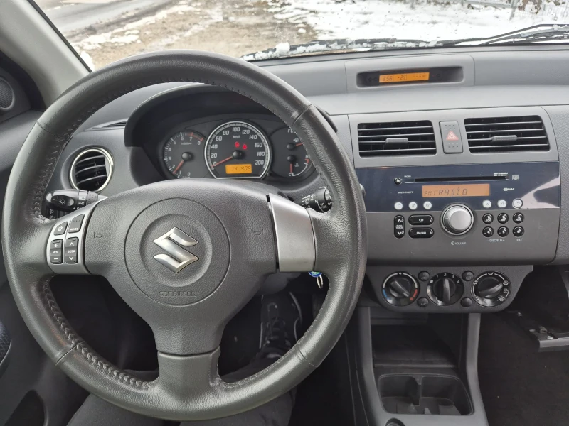 Suzuki Swift 1.3 4х4 FACELIFT , снимка 10 - Автомобили и джипове - 52922540