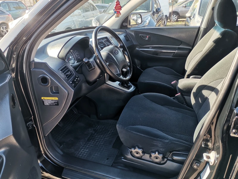 Hyundai Tucson 2.0I, снимка 12 - Автомобили и джипове - 52620831
