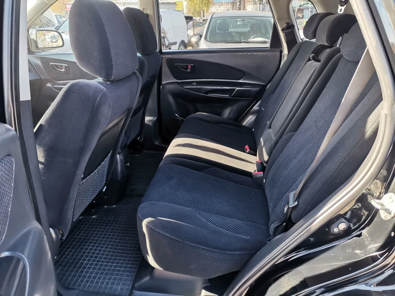 Hyundai Tucson 2.0I, снимка 13 - Автомобили и джипове - 52620831