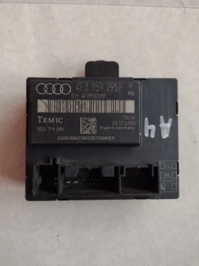 4F0959795F модул за управление на врати  AUDI A6 4F  4F0 959 795 F, снимка 1 - Части - 49167859