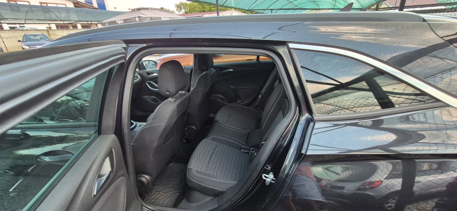 Opel Astra 1.6 NAVI, снимка 13 - Автомобили и джипове - 55024488
